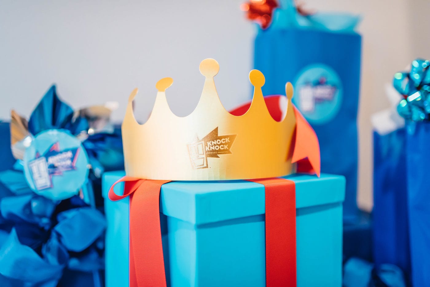 birthday crown surrounded by presents