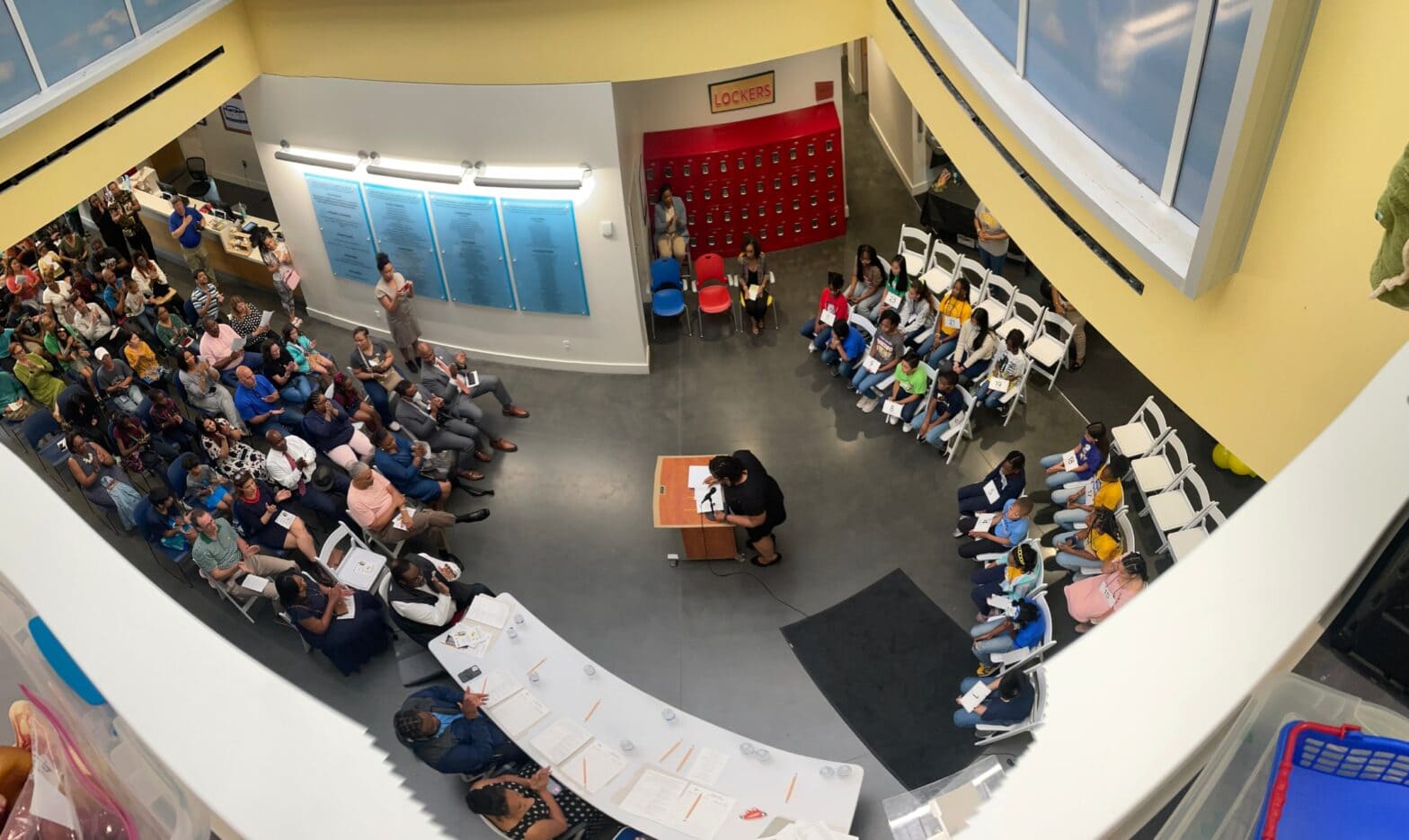 A spelling bee being held inside the Knock Knock Museum