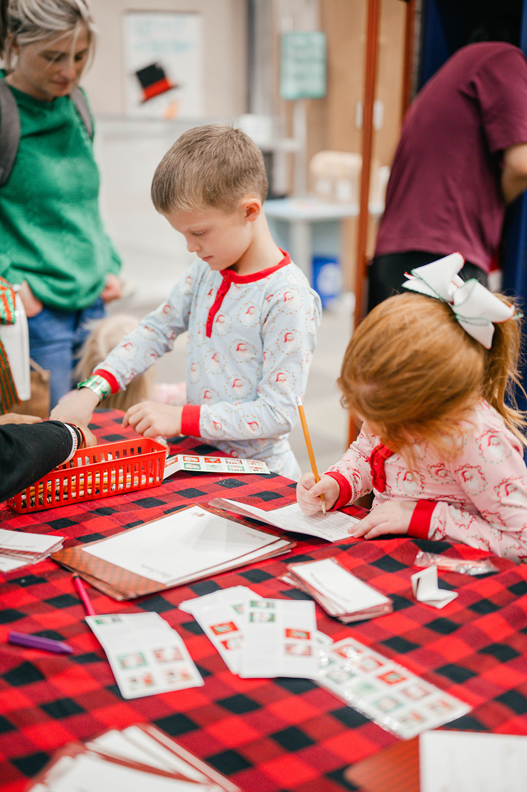 children write letters to Santa at Holly Jolly
