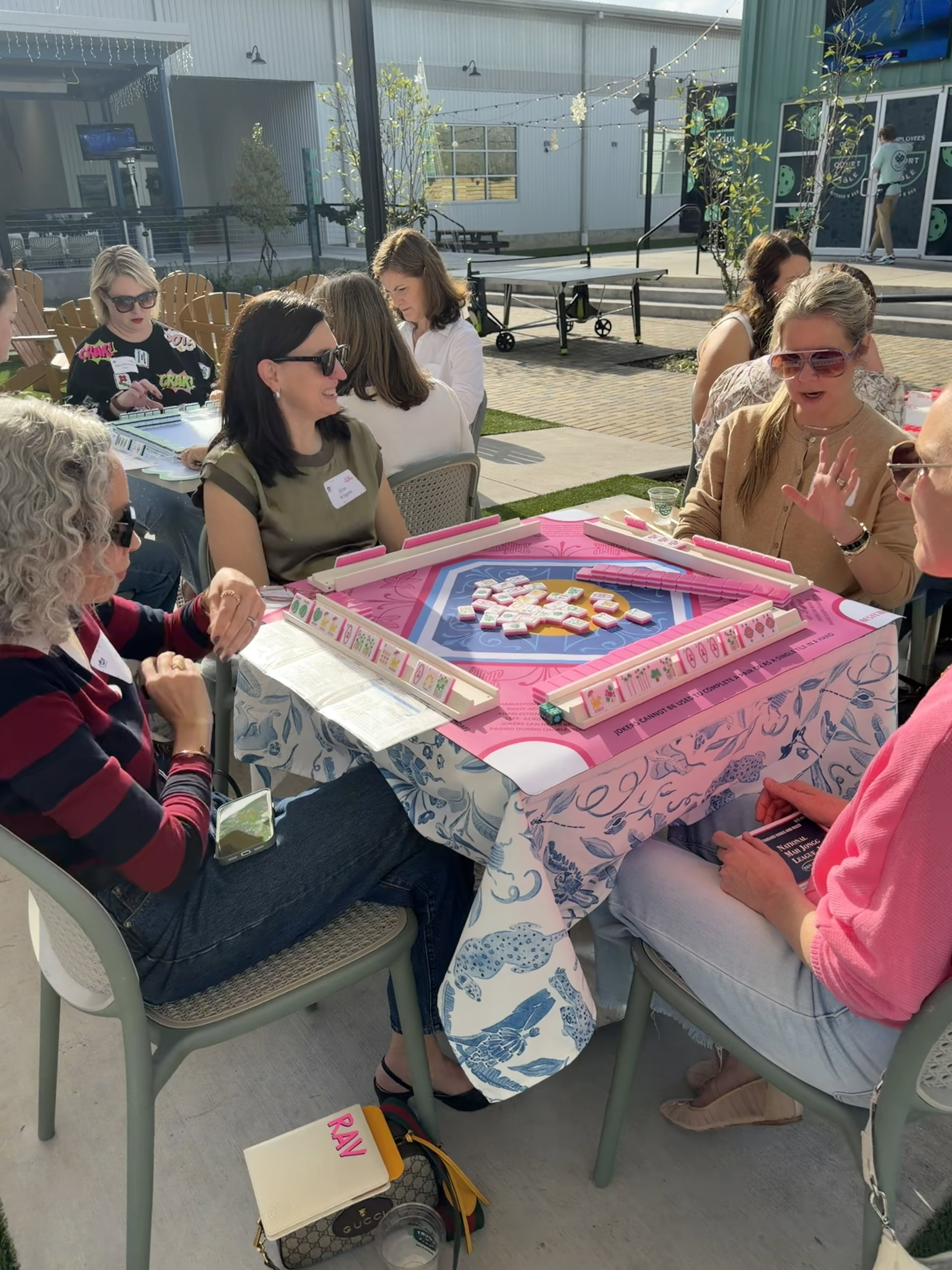 Ladies playing mahjong.