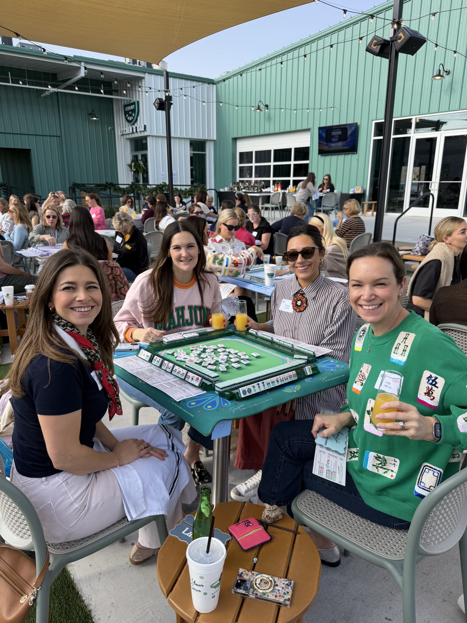 Ladies playing mahjong.